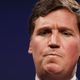 Illustration for article titled Tucker Carlson ruthlessly outs celebrities as generous, cool